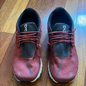 On Running Burgundy and Black Athletic Shoes